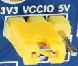 Jumper to select between 3.3 and 5 volts on a blue PCB with a yellow pin base.